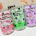 Christine Nguyen Instagram - #Cuteness overload! Can you imagine a row of each in your fridge? 🩷💚💜 #Costco #Raleys #HelloKittyandFriends #bobamilkteas #canneddrinks #taro #brownsugar #matcha