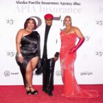 Claire Sulmers Instagram – Over the weekend, @fashionbombdaily touched down in #Alaska to cover the #redcarpet of @tracey_parrish_insurance_lady ‘s 25th anniversary celebration of her company @apiainsurance ! The soirée was action packed, and included several performances including poetry by @dasha_kellham , giveaways by @yvettecrocker_artist , music by @graceweber , comedy by @kellykellz_22 , and looks from @alaskafurgalleryanchorage , modeled by @silverfoxsquad ! @imdrcah and I closed the night by awarding one of the guests with a cash prize for #bestdressed ! It was a fab time, and I loved to see how people get down in the Last Frontier! For the night, I wore a @valdrinsahiti gown and gloves from @tsmgofashionrental , and later slipped on a cape from @thefurandleathercentre ! Thx to @zerinaakers and @baldwinwearsblack for helping me look and feel glam in #Alaska ! Stay tuned for more pix + a write up on FashionBombDaily.com and TheBombLife.com.
To have #fashionbombdaily cover your event, e-mail book@clairesulmers.com. What do you think? 
Makeup: @aderaseuoc 
📸 : @sylvanusedi_photo 
#clairesulmers #thebomblife #alaskaphotography #alaskaadventure #alaskaliving #alaskalove #traceyparrish #clairesulmers #apiainsurance #tsmgofashionrental Anchorage, Alaska