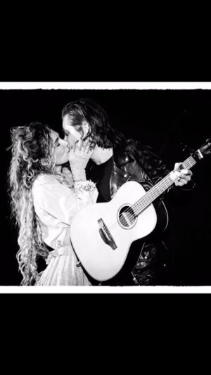 Clare Bowen Instagram - 6 years hitched. Handfasted longer. The best of friends since YOUNG walked into BOWEN’S dressing room at the @bridgestonearenaofficial a decade ago, and our lives changed forever. We had a big party about it. 🥳✨ If you were at @bsthydepark or the #NashvilleReunionTour or really anywhere near us, you know we’re still partying about it. ❤️‍🔥 This is what WATER TO WINE is all about right here. Probably gunna party about it some more today we reckon. Love y’all! 🌈🖤✨

📷 @alyssajoyphoto + @christiegoodwin 
🧵 @magnoliapearlclothing + @oliazavozina + @allsaints 

#bowenyoung #watertowine #handfasting #wedding #blackandwhite #clarebowen #brandonrobertyoung #miracle #party #dance #countrymusic #americana #nashville #bestfriends #chaos #love