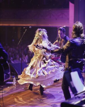 Clare Bowen Instagram - @magnoliapearlclothing was made to be danced in. 🤍 Thank you, @magnoliapearl for your beautiful creations. ✩₊˚.⋆☾⋆⁺₊✧✮ ⋆ ˚｡𖦹 ⋆｡°✩

📷 @timothyjamesbowen 

#NashvilleReunionTour #magnoliapearl #spin #dance #jump #tambourine #clarebowen #bowenyoung #rymanauditorium #nashville #joy #silk #cotton #iwhipmyeverythingbackandforth