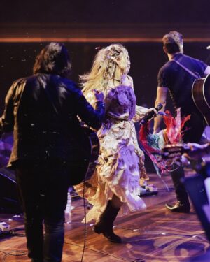 Clare Bowen Instagram - @magnoliapearlclothing was made to be danced in. 🤍 Thank you, @magnoliapearl for your beautiful creations. ✩₊˚.⋆☾⋆⁺₊✧✮ ⋆ ˚｡𖦹 ⋆｡°✩

📷 @timothyjamesbowen 

#NashvilleReunionTour #magnoliapearl #spin #dance #jump #tambourine #clarebowen #bowenyoung #rymanauditorium #nashville #joy #silk #cotton #iwhipmyeverythingbackandforth