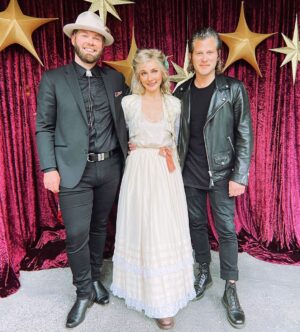 Clare Bowen Instagram - ♥️AUSTRALIA♥️ ONE WEEK TIL WE’RE BACK ON THE ROAD! 🥳 @imogenclarkmusic is coming too. 🥰✨ Here we are at the @carolsbycandlelight_aus rehearsal being all stoked about it. (Wicked fun day.) Can’t wait to see you - ticket link in bio! 🩵🫧

🧵 @harlowlovesdaisyofficial @magnoliapearlclothing @allsaints 

#americana #storytelling #acoustic #livemusic #countrymusic #nashville #australia #bowenyoung #clarebowen #brandonrobertyoung #timothyjamesbowen #imogenclark #fam #magnoliapearl #harlowlovesdaisy #allsaints #vintage