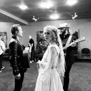 Clare Bowen Instagram - @carolsbycandlelight_aus rehearsal day behind the scenes chaos series. Also the day @brandonrobertyoung became best friends with the illustrious @themarciahines, and we deduced that @pattinewtonofficial came off the same (very limited edition) height production line as @dollyparton. 👯‍♀️✨ Thank you @harlowlovesdaisyofficial for Clare’s gorgeous rehearsal day ballgown! Nothing like a hand restored century old silk skirt to make a three hundred year old faerie feel extra everything.. ♥️🕯️✨

#carolsbycandlelight #visionaustralia #rehearsal #bts #harlowlovesdaisy #magnoliapearl #timothyjamesbowen #pattinewton #marciahines #clarebowen #brandonrobertyoung #bowenyoung #melbourne #nashville #chaos #allsaints #americana #countrymusic #christmas