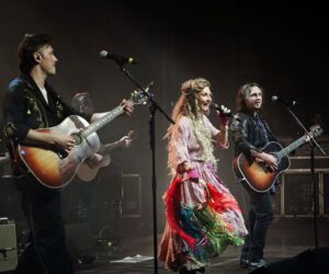 Clare Bowen Instagram - The #NashvilleReunionTour was SO much fun. Do you know which song we’re singing here? It’s one of my faves. 🥰✨

📷 @christiegoodwin ✨
👗 @magnoliapearlclothing 🤍

#nashville #london #jonathanjackson #clarebowen #bowenyoung #sampalladio #livemusic #nashvilleabc #nashvillecmt #tambourine #slinginrainbows #brandonrobertyoung #countrymusic #americana #family