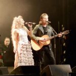 Clare Bowen Instagram - Glasgow. 💜✨ Where should we head next? ｡･:*:･ﾟ★,｡･:*:･ﾟ☆ 📷 @timothyjamesbowen 🧵 @magnoliapearlclothing + @allsaints #tbt #nashvillereuniontour #countrymusic #americana #love #watertowine #magnoliapearl #couple #nashville #glasgow