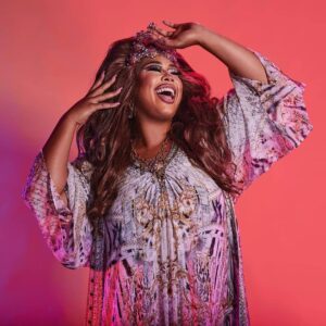Coco Jumbo Instagram - Thank you @camillawithlove for letting me be apart of your Pride campaign! ❤️🧡💛💚💙💜

This Pride I'd love everybody to embrace and truly love themselves - Love whoever you want to be and live without restrictions! with COVID we've had so many restrictions, so now its time to break free and just love everybody!!

Im wearing Print "Gates Of Glory" Pleat Sleeve Long Dress And Kimono Coat!! 

Photography - @stevenchee
Stylist - @fleureganstyle
Hair - @bradmullinshair + @wiggedoutau
Makeup - me + @nonismithmakeup