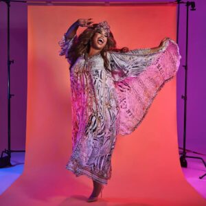 Coco Jumbo Instagram - Thank you @camillawithlove for letting me be apart of your Pride campaign! ❤️🧡💛💚💙💜

This Pride I'd love everybody to embrace and truly love themselves - Love whoever you want to be and live without restrictions! with COVID we've had so many restrictions, so now its time to break free and just love everybody!!

Im wearing Print "Gates Of Glory" Pleat Sleeve Long Dress And Kimono Coat!! 

Photography - @stevenchee
Stylist - @fleureganstyle
Hair - @bradmullinshair + @wiggedoutau
Makeup - me + @nonismithmakeup