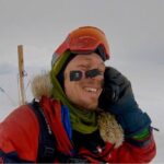Colin O'Brady Instagram - Day 54: FINISH LINE!!! I did it! The Impossible First ✅. 32 hours and 30 minutes after leaving my last camp early Christmas morning, I covered the remaining ~80 miles in one continuous “Antarctica Ultramarathon” push to the finish line. The wooden post in the background of this picture marks the edge of the Ross Ice Shelf, where Antarctica’s land mass ends and the sea ice begins. As I pulled my sled over this invisible line, I accomplished my goal: to become the first person in history to traverse the continent of Antarctica coast to coast solo, unsupported and unaided. While the last 32 hours were some of the most challenging hours of my life, they have quite honestly been some of the best moments I have ever experienced. I was locked in a deep flow state the entire time, equally focused on the end goal, while allowing my mind to recount the profound lessons of this journey. I’m delirious writing this as I haven’t slept yet. There is so much to process and integrate and there will be many more posts to acknowledge the incredible group of people who supported this project. But for now, I want to simply recognize my #1 who I, of course, called immediately upon finishing. I burst into tears making this call. I was never alone out there. @jennabesaw you walked every step with me and guided me with your courage and strength. WE DID IT!! We turned our dream into reality and proved that The Impossible First is indeed possible. “It always seems impossible until it’s done.” - Nelson Mandela. #TheImpossibleFirst #BePossible