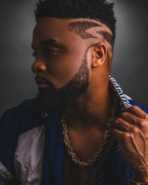 Cory Graves Instagram - I woke up and decided to cut my hair. This is the outcome 🤙🏾 #90sbaby
