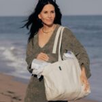 Courteney Cox Instagram - The @homecourt Tote is out! Originally designed as a cleaning caddy but is perfect for the beach, farmer’s market, traveling and so much more. And the best part is…it’s sustainably manufactured with @thenewdenimproject using upcycled materials!