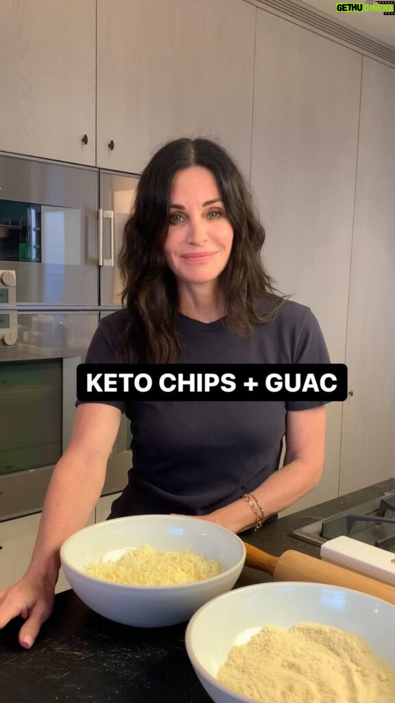 Courteney Cox Instagram - Keto Chips and Guac 🥑 Chips •one cup blanched almond flour •two cups shredded mozzarella •seasonings of choice Guacamole •avocados •lime •maldon sea salt •cilantro 1. Start with almond flour and seasonings in a large mixing bowl. 2. Microwave mozzarella cheese for 1.5-2 mins, until warm and melted. 3. Pour the melted cheese on the almond flour and mix well, until a thick dough forms. 4. Transfer the ball of dough onto a large sheet of parchment paper and flatten it. Place a second sheet of parchment paper over the top and press down. Using a rolling pin, roll out the dough until about 1/4 inch thick. 5. Use a pizza cutter to cut out small triangular shapes. Place the tortilla chips on a lined baking sheet and bake for 12-15 minutes, or until golden brown around the edges. Allow cooling on the baking sheet completely. Serve with guac! Thanks for the recipe, @thebigmansworld!