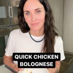 Courteney Cox Instagram - Quick Chicken Bolognese •2 T olive oil •1 medium yellow onion, chopped •2 cloves of garlic, minced •1/2 tsp Italian seasoning •1/4 tsp salt •2 lb ground white meat chicken •1 sweet Italian turkey sausage, casing removed •1 spicy Italian turkey sausage, casing removed •6 cups of your favorite marinara sauce (I like Rao’s) •1 T fresh parsley, chopped •1 T fresh basil, chopped 1. In a large saucepan, heat the olive oil over med-hi heat. Crumble both sausages and sauté until cooked through. Remove from pan and set aside. 2. In the same pan, over med-hi heat, sauté the onion and garlic until the onion is translucent, about 3 mins. 3. Add the ground chicken, salt, and Italian seasoning. Cook until chicken is done, breaking it up with a wooden spoon or potato masher. 4. Put the sausage back in the pan. 5. Add marinara sauce, parsley, basil, and simmer for 20-30 mins. 6. Serve over your favorite pasta or veggie pasta. #courteneycoox Thanks Jill Elmore!