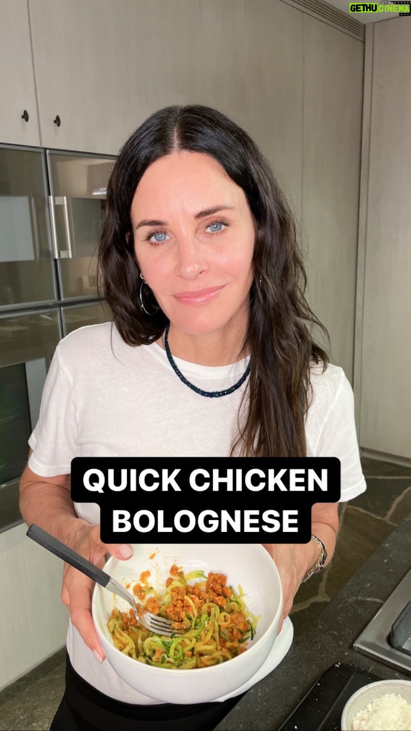 Courteney Cox Instagram - Quick Chicken Bolognese •2 T olive oil •1 medium yellow onion, chopped •2 cloves of garlic, minced •1/2 tsp Italian seasoning •1/4 tsp salt •2 lb ground white meat chicken •1 sweet Italian turkey sausage, casing removed •1 spicy Italian turkey sausage, casing removed •6 cups of your favorite marinara sauce (I like Rao’s) •1 T fresh parsley, chopped •1 T fresh basil, chopped 1. In a large saucepan, heat the olive oil over med-hi heat. Crumble both sausages and sauté until cooked through. Remove from pan and set aside. 2. In the same pan, over med-hi heat, sauté the onion and garlic until the onion is translucent, about 3 mins. 3. Add the ground chicken, salt, and Italian seasoning. Cook until chicken is done, breaking it up with a wooden spoon or potato masher. 4. Put the sausage back in the pan. 5. Add marinara sauce, parsley, basil, and simmer for 20-30 mins. 6. Serve over your favorite pasta or veggie pasta. #courteneycoox Thanks Jill Elmore!