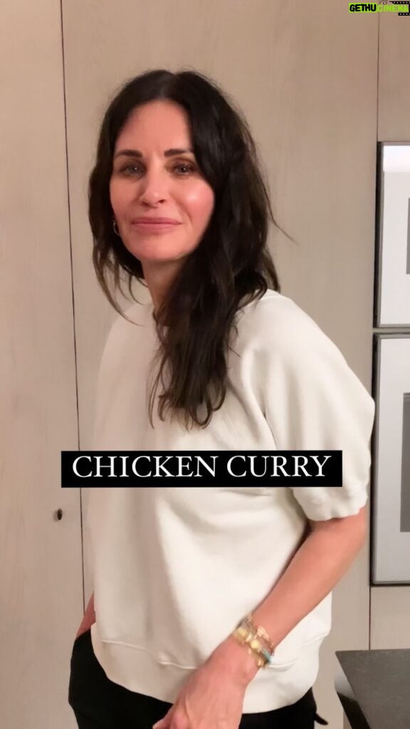 Courteney Cox Instagram - CHICKEN CURRY... you ready for this one? 👩‍🍳 •1 lb. chicken tenders cut into small cubes •1 small onion, chopped •1/2 tsp. chopped serrano chili (optional) •1 tsp. unsalted curry powder •Salt to taste •1-2 cups curry sauce (recipe below) •1/2 T chopped green onion •1/2 T chopped cilantro 1. Heat a medium size frying pan over med-hi heat. Spray with coconut oil, sauté onion and serrano chili. 2. Add chicken, curry powder and salt. Sauté until chicken is slightly brown on outside but not cooked through. 3. Add curry sauce and reduce heat to simmer. Cover and simmer for 5-10 minutes until chicken is cooked through. 4. Top with chopped cilantro and onion. CURRY SAUCE: •1/2 brown onion •1 clove garlic •1 T ginger •1/2 serrano chili (stem and seeds removed) •1 to 2 T unsalted curry powder •1 box of organic chicken stock •1 cup of chopped cauliflower 1. Place the onion, garlic, ginger and chili in a food processor and blend until you have a paste. 2. Heat a medium size stock pot over med-hi heat. Add paste and 1 to 2 T of broth to sauté paste until it starts to brown. Add more chicken stock little by little if the paste is browning too fast or starting to burn. 3. Once the paste is cooked, add the curry powder and another splash of chicken stock. Cook for another minute, stirring the mixture so it doesn’t burn. 4. Add the rest of the chicken stock and the cauliflower. Bring to boil, then reduce heat and simmer for 20 minutes or so, until cauliflower is tender. 5. Transfer to a blender and puree until sauce is smooth. Always start blender on lowest speed when you are blending hot food, otherwise it will explode all over the kitchen. You can add water or more broth if sauce is too thick. 6. Taste and adjust seasoning, adding salt or coconut milk for sweetness. Serve over cauliflower or basmati rice. Thanks, Jill Elmore! 🎥: @jadeehlers