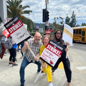 Craig Mazin Instagram - Fighting the good fight in front of Universal at the video game-themed picket line with the great @grosstastic and @merledandridge. I call our pose "strike squat."

Pick us as your NPC allies when you're ready to raid the fortress. Or the AMPTP. Whichever.