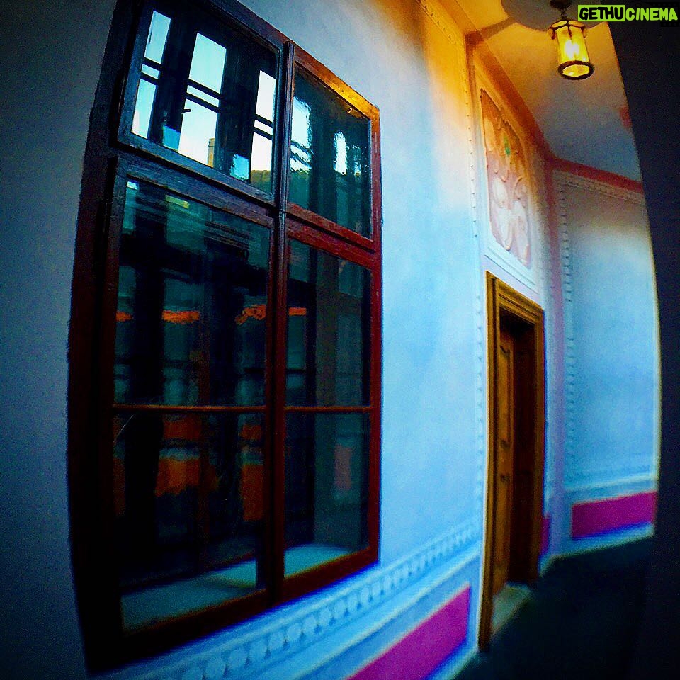 Crispin Glover Instagram - This is a wider photograph that includes an image of the fresco above the door that was also seen in the previous posted image. Also more of the fresco of the hallway can be seen. Zamek Konarovice Czech Republic