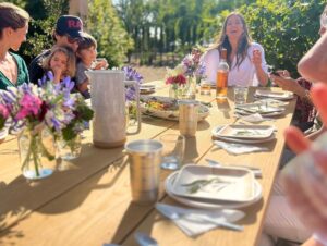 Cristina Ferrare Instagram - We spent the afternoon at our  daughters @alextcooks and her fiancé’s @itsnickdrake home with the amazing  production team from @movablefeast_tv that Alex hosts for @pbs airing this fall! The food was simply beyond! A great time was had by all as we gathered around the table to enjoy the bounty with family and friends!Thank you to everyone for a spectacular afternoon! @wbgh #moveablefeast #tv #cookingshow #food #love #family