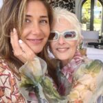 Cristina Ferrare Instagram - I spent the best afternoon with my daughter @alextcooks along with some of my dear and cherished friends. This was an exquisite and heartfelt event with @voguemagazine and hosted by my dear friend mollanderson in her beautiful home. @drjashton chief medical correspondent for ABC News, founder and chef Helene Henderson of @malibufarm and Moll spoke about beauty and balance in your life! It wasn’t hard to find it there as we were surrounded by beauty as far as you could see. The blue ocean, colorful gardens, lavender table settings with fresh flowers, the aroma of the ocean air and warmth of the sun! Thank you Moll for sharing your vision on how to incorporate beauty and balance into our lives! @mollanderson 🤗❤️ #womensfashion #womenempowerment #womensupportingwomen girlfriends #healthandbalance