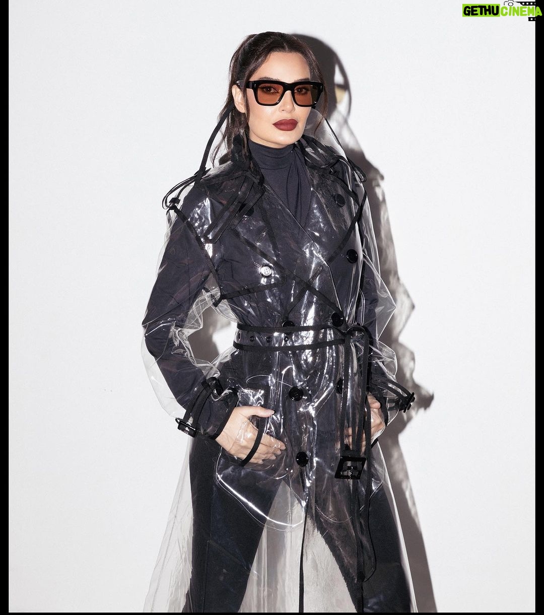 Cyrine Abdel Nour Instagram - Style is personality 😎 Wearing @moncler set and limited edition @dolcegabbana transparent coat via @netaporter