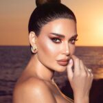 Cyrine Abdel Nour Instagram - الانثى كالزجاجة تعكس لك جمال الحياة #سيرين_عبدالنور @kifah.ballani @roy_bechara @ramikadi @mhammadharb @georgeschamoun.fashion @lateliernawbar #cyrineabdelnour #nature #loveyourself #orange Lebanon