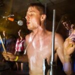 Dan Deacon Instagram – Kevin was one of the most intense people I knew. He was intense about his passions, his drumming was intense, his kindness and gentle nature were intense kindness and extreme softness, his stoicism was intense and his mysterious nature was intense. His hatred for modern technology was intense. His love of puns was in tents. He was someone who was both of the past and the future, always at odds with the now. I could only know him the way I knew him as others would know him in their own unique way. I love the person he was when he shared time with me. 

As a person he was a most beautiful tree: powerful and peaceful, a great listener that was at all times growing and always giving. And almost always covered in dirt. He was extremely special. The passion he put into the things that inspired him inspired all around him. I feel so intensely lucky to have know him, played so much  music with him, traveled around the word with him countless times and to most of all count him as a friend. I love him and I’m sad he’s gone. 

Grief is easily the most intense and complex beast of them all, always changing and shifting. Grief has deep, wide asymmetrical tides with waves of intensity that range from waves we can can ride out that don’t overwhelm but still feel their weight, waves we barely notice as grief but still move through us leaving their reverberance, and some waves that crash down on us leaving us wrecked and tumbled on the beach of our most raw emotions. 

Grief is on going. It’s changes as we change. As time moves the grief comes with us in its new form as we are in our new forms. It mixes and mingles with old grief and becomes a new thing entirely. Grief isn’t bad. Grief is there to help us deal with the most sad things we can never truly understand or come to terms with. Grief is a warm blanket saying it’s ok to feel the feelings in the full spectrum of intensities that they come in, it’s good to remember and acknowledge the loss in all the ways you never thought possible.

I miss Kevin and I’ll miss Kevin in new ways throughout the rest of life. I’ve never met another person even close to being like him. The world was a better place with him in it.