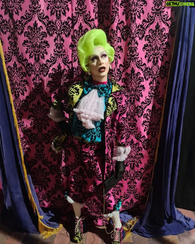 Daniel Wallace Instagram - Sometimes i like to blend in....It was Press night last night and i just couldn't resist popping on this lil number by @freakcouturemcr The curtains really do match the drapes!!!Can you believe i own a suit made from the same gorgeous material as the curtains that hang in Shantay Manor in @deathdropplay ?! A lovely time was had and i now own the worst hangover everrrrrr to prove it! Suit by @freakcouturemcr Hair by @florencias_wigs Gorgeous moon earringz by @wonderfullittleweirdos Piccys by @applederrieres #lovelytime #Curtain #wallflower #pink #green #drag #neon Criterion Theatre
