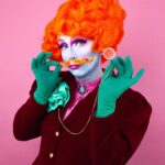 Daniel Wallace Instagram – A final one for the trio!Had a (snow)ball creating these images with @florencias_wigs and @faketrashstudio for @florencias_wigs new tasche and wig line for the winter!
Look at me being an effeminate queer Victorian gent wearing his #Greencarnation with #pride
#pink #orange #dragqueen #Manchesterqueen #manchesterking #genderfuck #genderplay #Drag #Winter Islington Mill