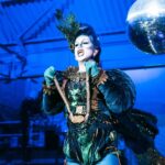 Daniel Wallace Instagram - Had a #lovelytime performing for @thefirehousemcr on Thursday!If you haven't been you really should!The space is so fabulous...The show is amazing....a runway...a catwalk...drag....i hear the food is delicious and i can highly recommend the spicey margarita's!(might have indulged) Here i am living my #peacock fantasy and being a big old attention seeking show off all in the name of the platty joobs!Wearing @lizziebiscuits and hair by @wigsbydaviddarby And i got to meet the lovely @dakota.schiffer 💙 Photo's by the uber talented @squxsh__ #Drag #Manchesterqueen #Jubilee #royalty The Firehouse