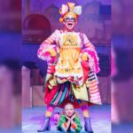 Daniel Wallace Instagram – Less than a week to go before we finish and having such a magicall time with @phapanto and @marinatheatre playing Widow Twankey in this years Aladdin!🌟
Panto is such a glorious tradition that includes every generation and is a child’s first introduction to theatre!So it always makes me laugh when people are outraged by children being exposed to Drag or Drag story time when this has literally been a thing for 100’s of years.
Merry Christmas from this old dame in Lowestoft!
Photo by @fourthwallphotographyuk❤
Dress by @lizziebiscuits 💗
#Panto #Pantomime #nothinglikeadame #Twankey #manchesterqueens