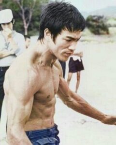 Danny Ramirez Instagram - “Yo Julius, what should I aim for?” - Me “… Bruce Lee” - Julius I’ll never move and look like the GOAT Bruce Lee, but took that as a challenge and these last 3 1/2 months training like an athlete and a martial artist have been a childhood dream. Shout out to @nicshimonek and @mrdrewss for everything through the process. A long way to go from our goals but feeling great about the progress this morning.