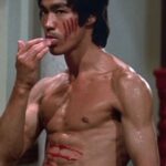 Danny Ramirez Instagram – “Yo Julius, what should I aim for?” – Me
“… Bruce Lee” – Julius

I’ll never move and look like the GOAT Bruce Lee, but took that as a challenge and these last 3 1/2 months training like an athlete and a martial artist have been a childhood dream. 

Shout out to @nicshimonek and @mrdrewss for everything through the process. A long way to go from our goals but feeling great about the progress this morning.