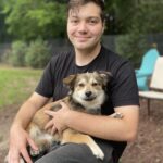Danny Robertshaw Instagram - 🎉 ADOPTED! Sweet puppy EVEE knew exactly who to pick as her new forever person when she locked onto our Doghouse staff member, Elliot Kinlaw. They are the best match! Isn't this just the best photo? 😍 Another #perfectmatch from #dannyronsrescue