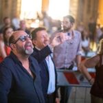 Dany Boon Instagram - Projection magique de Bienvenue chez les Ch’tis au festival de Bologne sur un écran géant devant 3000 personnes. Extraordinaire! Merci Gian Luca pour ce moment extraordinaire ❤️