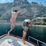 David Lim Instagram - Italy is amazing. It’s even better with great friends. 😎🌊⚓️🇮🇹 #sicilysquad #taormina #isolabella #boatday Isola Bella, Taormina, Sicily