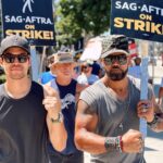 David Lim Instagram - Strength in numbers. The @swatcbs fam showed out on the picket lines! Give the writers and actors a fair deal, and let’s get back to work. 💥🪧💪🏽 #SAGAFTRAstrong #WGAstrong #rollswat Radford Studio Center