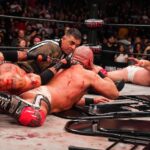 David Michael Harwood Instagram - One year ago, today, we the had the greatest match of our career. To me, it encapsulates everything FTR has represented; emotion. We couldn’t have achieved that without having our equals there to bring that emotion out of us. The story going into this match proves that, whatever you believe, there HAS to be something bigger than us out there. This night, we all 4 sat in the locker room, no one around, bloody from head to toe, each with a tequila in our hand, talking about the end of this rivalry. How we’ll never experience anything like this again. How all four of us, from now until forever, would be connected; and we were ok with that. How years from now, decades from now, we’d be traveling to conventions and meet & greets just to talk about this rivalry and THIS ONE MATCH in particular. Then it all changed. The picture of Jay, the intensity on his face, a chain wrapped around my mouth, the emotion in Paul, Cash desperately doing everything in his power, even if it means losing, to save his best friend from death while Mark is using every last ounce of energy in his body to block him, is the greatest snapshot of my career. Everyone that had a hand in this match & this moment, from Tony, The Briscoes, Cash, Paul, Posey, the camera men, the producers, I can’t thank you enough for what you’ve given me, my career, and my life.