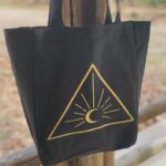 Dawn Olivieri Instagram - Moon Mountain tote!! So much cool merch on the Moon Mountain Site!! Head over and show your support and rock a symbol that is on its way to do more for the horse in this country than ever before. All proceeds go to help the babies. Link in the stories today then under “Merch” tab above after that. ❤️ Arkansas - the Natural State