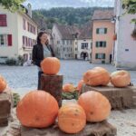 Deanna Yusoff Instagram - When your pumpkin patch game is so strong, even the ghosts are taking notes! 👻🎃 Have a fantastic Halloween, and enjoy the season! 🎃👻 #Halloween #pumpkin #pumpkinpatch #pumpkinseason #oldtown #saintursanne #jura #autumn #orange #ghost #seasonal #switzerland #deannatravels #nature #mideavaltown #october