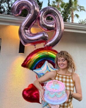 Debby Ryan Instagram - I turned 30 this summer, here are some of the birthday cakes of my 20s — 
Guess which one had my name spelled with an “ie” (classic) and then my friends rearranged the icing and guess which one my mom made 🏡