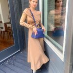 Debby Ryan Instagram - blue bag baby 💙🪁 #FendiPeekaboo @fendi 🤍 🕊@mrkimjones @silviaventurinifendi Baby Blues