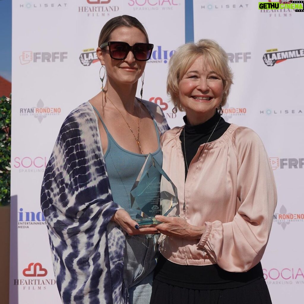 Dee Wallace Instagram - So beyond honored to have been awarded “Women of Influence” award by Heartlands Films and @susanpvicory at the Women Filmmakers Showcase for my contribution in the industry and world at large. I am so touched. And to be surprised by having my daughter present it was icing on the cake! #womeninfilm