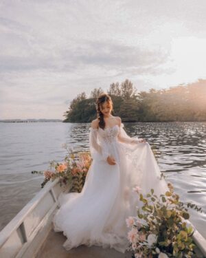 Denise Soong Ee Lyn Instagram - this is a Disney dream come true ✨

I am so happy we did this with the talented team (left their handles below) We wanted to have a shoot in Bali, because Nigel & I love to travel, and enjoy being by the water. When the team heard about this, they decided to bring a slice of Bali to us, since we couldn’t fly. I mean, how crazy is this. They got a boat and paddles and all?! I’ll never forget this day and I am so thankful to the team for their vision and talent 💕 

Photographer: @heystranger.photography @sam.heystranger @michael.heystranger

Gown & Suit: @bridefullyyours

Makeup: @dearmuse.makeup @coco_dearmuse @annie_dearmuse 

Florals: @5amflowers