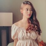 Denise Soong Ee Lyn Instagram - Happy 2nd day of LNY, outfit deets: Puffy back cross back dress from @thetinselrack Ring, necklace, earrings from @thestarry.co