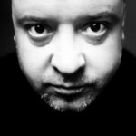 Denys Rodnianskyi Instagram - Дорогая российская творческая интеллигенция, благодарю вас, за выражение поддержки Украине и осуждение действий ёбнутого диктатора. Вы прекрасные люди, и давно всё понимаете, так что дальше можете не читать. Это не про вас. Теперь раткое пояснение для тех, кто думает, что всё ок, и это их не касается. Знаете, как это было? Позавчера я выстраивал стратегию своего профессионального развития в кинематографе и театре, на ближайшие 10 лет. Планировал отвезти детей в школу, потом потренироваться в зале, и поехать на кастинг. В Воскресенье на съемку… В Понедельник - на репетицию И тут, 36 часов спустя… Кастинга нет. Тренеровки нет. Съемки нет. А есть вот что: Погибшие защитники моей Украины… Разрушенные мосты… Стрельба по жилым кварталам… Мародёрство!!!! Перепуганные женщины… Плачущие дети… Выгнанные из родных домов и городов люди… Сломанные судьбы и разлученные семьи… Помните, что делал Гитлер? Так вот, сейчас то же самое делает ваш маньяк. А фашистами называет нас!!! Но с ним всё понятно. Вопрос в другом. Что стало с вами??? Как вас убедили воспринимать акт агрессии, как акт освобождения??? Это будто вы ловите вора у себя в квартире, а он такой: «нет, это не твоя квартира, это выход из лифта! Я его таковым признал, значит так и есть!» - и идёт в спальню к вашим детям, вы пытаетесь его остановить, а он вынимает пистолет и стреляет вам в лоб. В вашем доме!!! А потом его адвокат рассказывает присяжным, что мол, прав был мой клиент. Вы ж не по понятиям жили, не хотели поделиться с ближним, да ещё и первым на него напали, и он, защищаясь, отстрелил вам башку. Так что сами виноваты… Что нужно было сделать с вашими мозгами, что бы вы в это поверили??? 3. Завершительные положения: Те из вас, кто до сих пор поддерживает, уважает и разделяет взгляды своего ёбнутого царя, отные мои личные враги. Именно, благодаря вашей поддержке, этот маньяк пришёл с войной в мой дом. Прямо сейчас по Киеву бьют ракетами! Прямо сейчас миллионы людей проклинают это животное, и всех вас. Вам не простят этого никогда! Горите в аду вместе с ним! СЛАВА УКРАЇНІ !!!