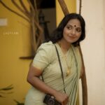 Dhanya Ananya Instagram - A 90s enchantment as she steps out, embracing the world with a timeless smile. Ft: @kanmaniii3 Captured by: @ladyc.am Mua: @_the_glam_factor___ Saree: @jaanki_sarees_ Location: @design.ashram