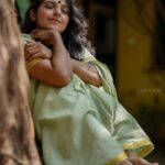 Dhanya Ananya Instagram - A 90s enchantment as she steps out, embracing the world with a timeless smile. Ft: @kanmaniii3 Captured by: @ladyc.am Mua: @_the_glam_factor___ Saree: @jaanki_sarees_ Location: @design.ashram
