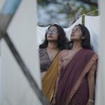 Dhanya Ananya Instagram - I am my own muse! Dop : @rahim_ibn_rasheed inframe: @kanmaniii3 @shilpachandran__ location : mattanchery #fridakahlo #sari #portraitphotography #streetphotography #tamil #mattancherry Mattancherry