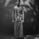 Dian Sastrowardoyo Instagram - The distinctive Kebaya Janggan from Yogyakarta derives its name from the Javanese term “Janggan,” eloquently signifying an ensemble that gracefully covers the neck. By bringing Kebaya Janggan into the spotlight, @hagaipakan initially sought to elevate the fashion allure of the costume showcased in Gadis Kretek. View the article via the link in bio. @therealdisastr wears a custom-made organza Kebaya Janggan with #SAPTOJOPattern Kadazan leitmotifs and Sitta Heels, both in Nero palette. Photographer: @bramsky.bramsky Fashion Stylist: @hagaipakan Makeup Artist: @ryanogilvy Hair Stylist: @iwanetaufik_hair Location: @thedharmawangsa #SAPTOJOHeritage #SAPTOJOBerkain #SAPTOJOEditorial