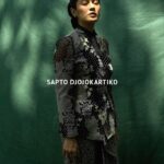 Dian Sastrowardoyo Instagram - The distinctive Kebaya Janggan from Yogyakarta derives its name from the Javanese term “Janggan,” eloquently signifying an ensemble that gracefully covers the neck. By bringing Kebaya Janggan into the spotlight, @hagaipakan initially sought to elevate the fashion allure of the costume showcased in Gadis Kretek. View the article via the link in bio. @therealdisastr wears a custom-made organza Kebaya Janggan with #SAPTOJOPattern Kadazan leitmotifs and Sitta Heels, both in Nero palette. Photographer: @bramsky.bramsky Fashion Stylist: @hagaipakan Makeup Artist: @ryanogilvy Hair Stylist: @iwanetaufik_hair Location: @thedharmawangsa #SAPTOJOHeritage #SAPTOJOBerkain #SAPTOJOEditorial