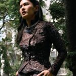 Dian Sastrowardoyo Instagram - Driven by a shared inspiration of Jeng Yah’s charismatic figure and compelling narrative from the critically acclaimed ‘Gadis Kretek’ series, costume designer @hagaipakan and @therealdisastr, who portrayed the role of Dasiyah, aspire to craft a response, channeling their gratitude and acknowledging the appreciation through this latest edition of SAPTOJO editorial. Read the full article via link in bio. Dian Sastrowardoyo wears a custom Kebaya Janggan embroidered with lurex and velvet, paired with double-waisted Amba pants, both in in Agro Dolce colorway. Photographer: @bramsky.bramsky Fashion Stylist: @hagaipakan Makeup Artist: @ryanogilvy Hair Stylist: @iwanetaufik_hair Location: @thedharmawangsa #SAPTOJOHeritage #SAPTOJOBerkain #SAPTOJOEditorial